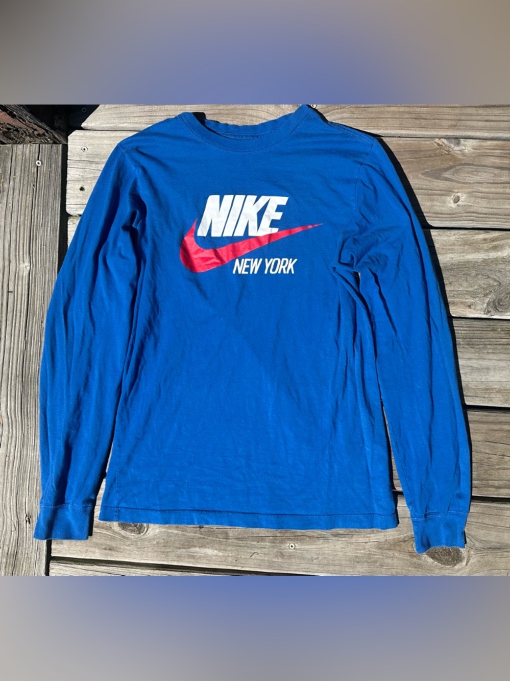 Nike Blue Long Sleeve Shirt with White Logo and Red Swoosh